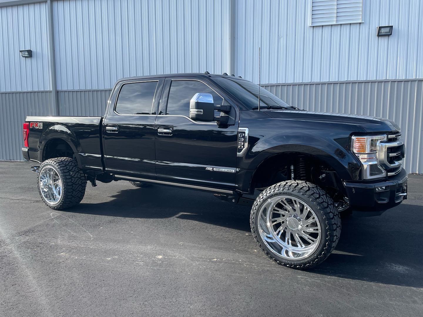 Black F250 with chrome wheels
